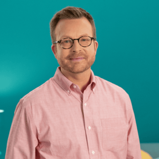 A headshot of Dr. Goldstein wearing glasses.